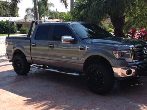 Lifted custom 2009 ford f-150 xlt crew cab pickup 4-door 5.4l