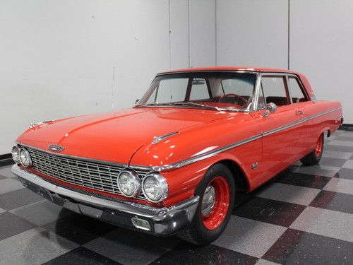 Q-code 390 ci 401 hp with dealer-installed triple deuce, beautiful rangoon red