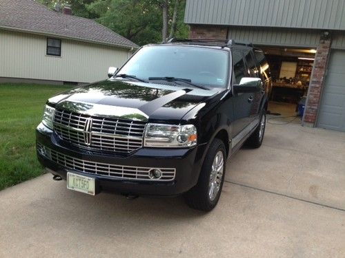 Black, special chrome package. 20' stock rims.