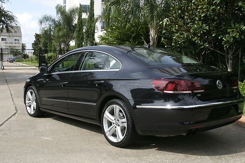 Cc 4dr cpe, 55 photos, sport ,like new, navigation, warranty,  bargain priced