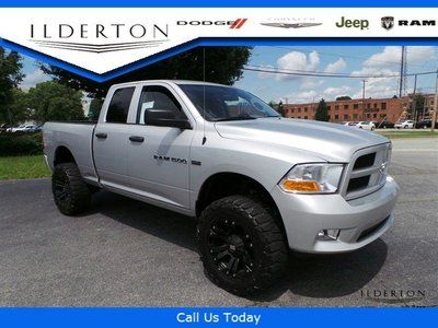 12 silver 4wd dodge truck 4"lift quad cab hemi 35" tires 20" wheels we finance