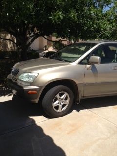 Lexus rx 300, tan.