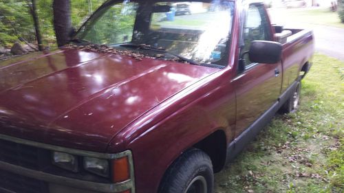 Good used 1/2 ton truck for sale. maroon in color, 5 speed manual transmission
