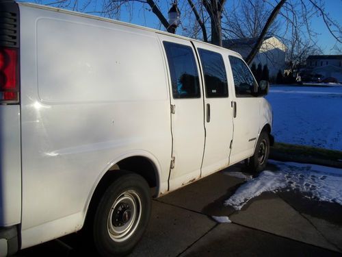 2000 gmc savana model 2500  van with 5.7 motor a/c with tool bin on one side