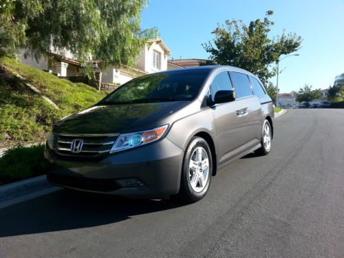 2012 odyssey touring no reserve 6 speed  navi hid&#039;s heat sunroo dvd park  camera