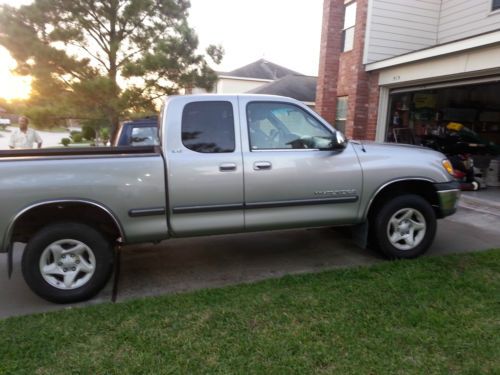 4 doors grey, toyotal tundra in excellent condition.