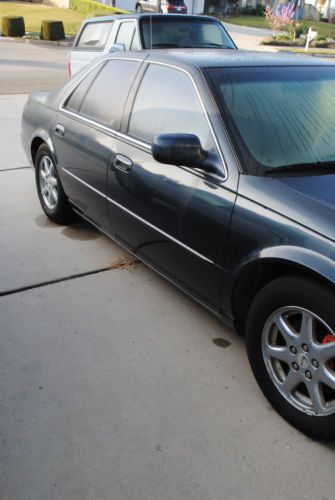 Dark blue,bone interior,sedan