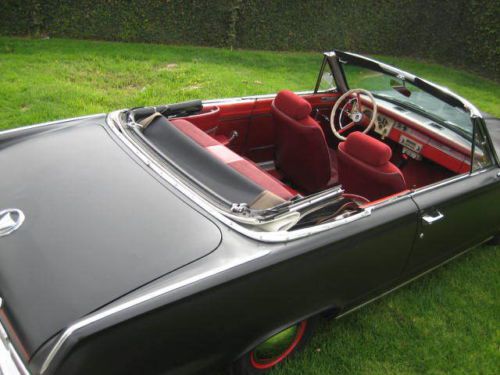 1963 plymouth valiant signet convertible -- looks cool and runs great.
