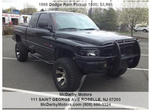 1998 dodge ram 1500 pick up with lift kit and 35 inch tires