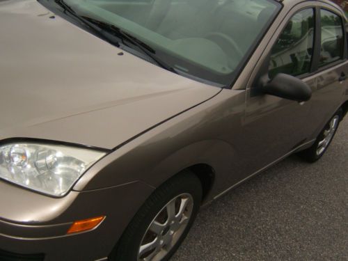 05-ford focus~12,850 miles - original owner, no damage/accidents ever-cold air