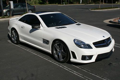 2011 mercedes benz sl63,  $160k msrp,   diamond white  w/ blk amg leather