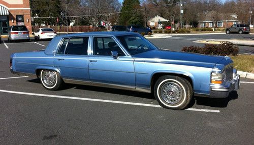 1989 cadillac fleetwood brougham sedan 4-door 5.0l - lt. blue ext/dark blue int