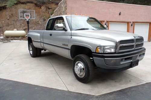 1996 dodge ram cummins diesel 4x4 56k orig miles! look! ext cab dually slt nice!