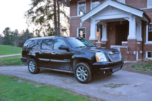 Gmc yukon denali xl with all options 7 passenger suburban black on black 113 pix