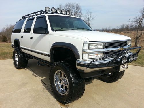 Beautiful lifted suburban lt    trick trucks custom monster truck !!!   look!!!!