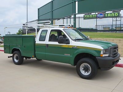 Look at this 2004 f-350 one owner utility bed with tommy lift gate fully svc