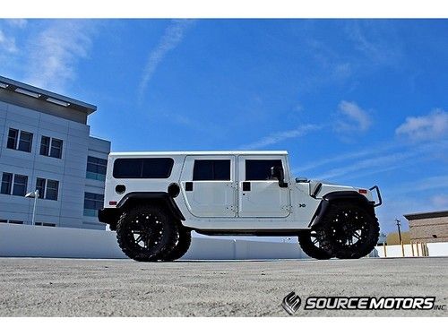 H1 white wagon, 22" wheels, elocker, fender flares, navigation, rockford fosgate