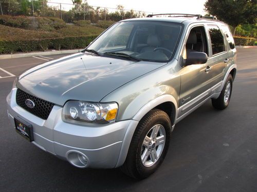 05 ford escape hybrid 4x4, nav. 113k, excellent 30mpg