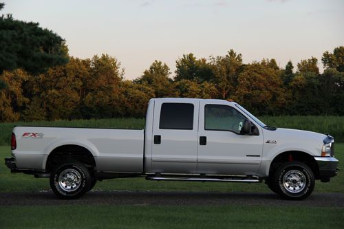 2003 ford f350 crew xlt fx4 srw 7.3l diesel 46k actual miles 4x4 mint no reserve