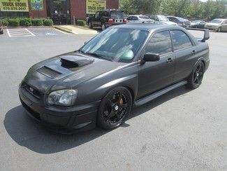 2005 subaru wrx sti over$8k in upgrades runs great we ship very fast bid now!!!