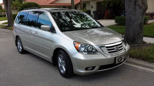 2008 honda odyssey touring full options+ nav  68,100 miles 1 owner 3rd row seat