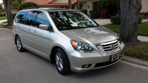 2008 honda odyssey touring full options+ nav  68,100 miles 1 owner 3rd row seat