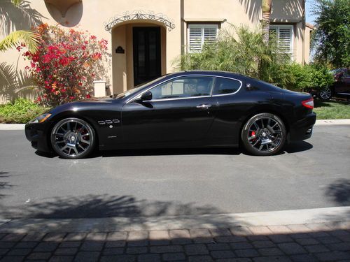 2008 black maserati gran turismo