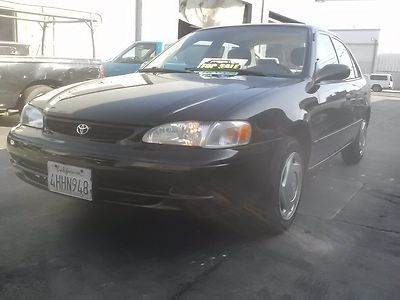 2000 corolla in great condition, low miles,with warranty