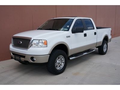 07 ford f150 lariat crew cab 4x4  leather mroof adj pedals park sensors cd chger