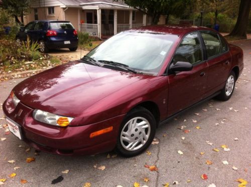 2002 saturn sl sedan  1.9l, 5 speed manual, 3 month warranty, 35mpg, drives grea