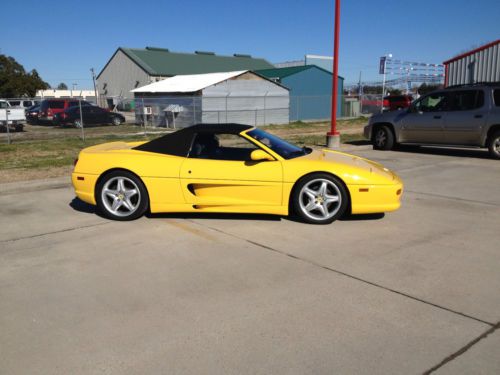 1997 ferrari f-355 spider. yellow