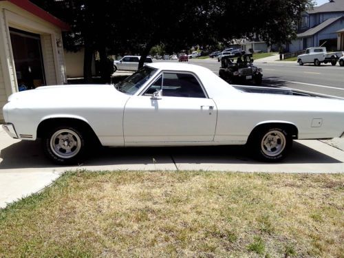White with blue interior, body in great condition, perfect muscle car look!