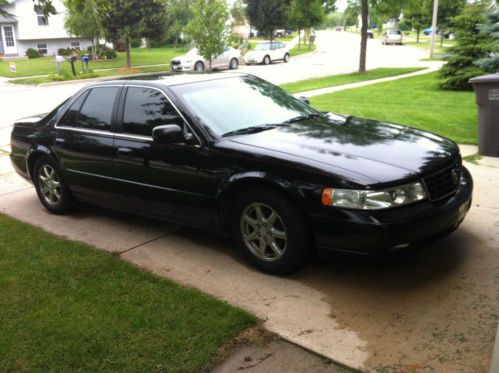 Cadillac sts black on black - clean inside and out!