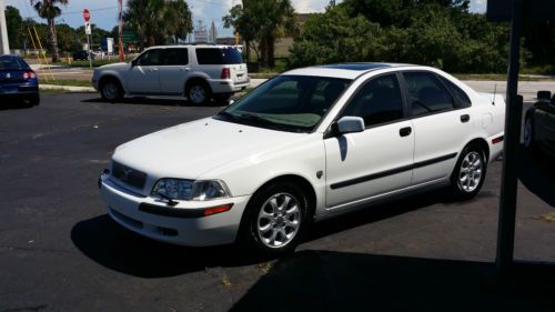 White with gray interior,cd,sunroof,new tires,great gas saver