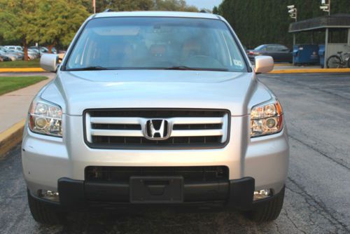 Honda pilot 2006 ex-l,heated leather,moon roof,low miles 36000,single owner.