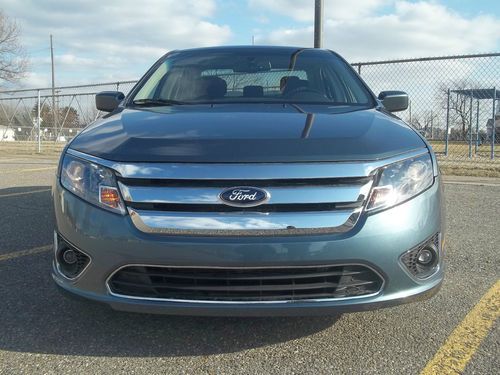 2012 ford fusion se-4door-sync-sunroof- 5000 mile only....no reserve.....rebuilt