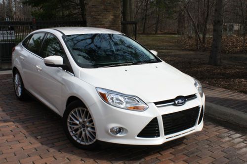 2012 focus sel.no reserve.leather/sensors/sync/alloys/p. seat/rebuilt