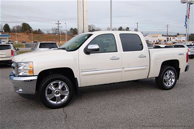 Save $8336 at empire chevy on this new leather all-star white diamond 4x4