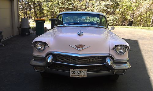 1956 cadillac deville 4 door v-8 pink with white top black cloth interior