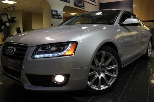 Premium plus navigation rare six speed manual one owner led daytime running lght