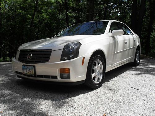 2003 cadillac cts only has 76,000 miles white diamond like new
