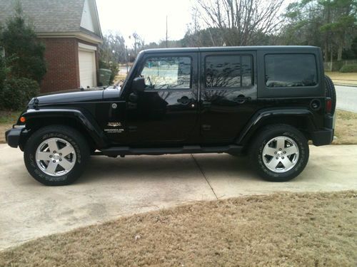 2011 jeep wrangler sahara 4-door (hard and soft top) with navigation system