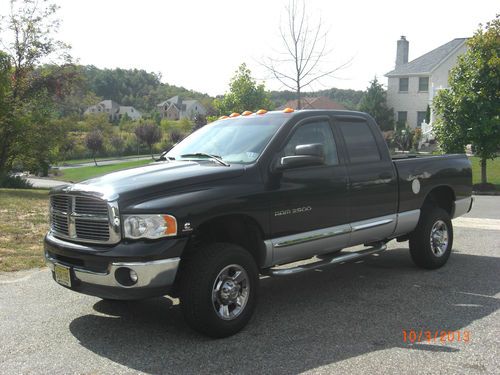 Laramie quad cab short bed 5.9l diesel 4wd 35.000 miles