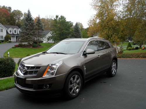 2011 cadillace srx premium suv, mocha. excellent, clean condition.