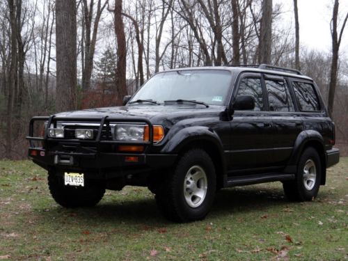 The last year of the 80 series in black wrapped with front and back arb bumpers