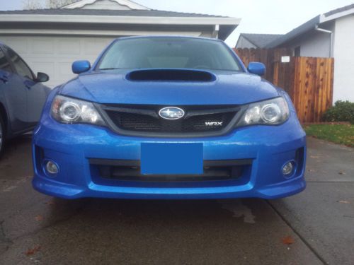 2011 rally blue wrx premium 4d with bonus winter wheel set.