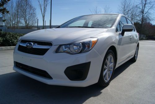 2012 subaru impreza wagon. premium. satin white pearl. over 30mpg! nice car!