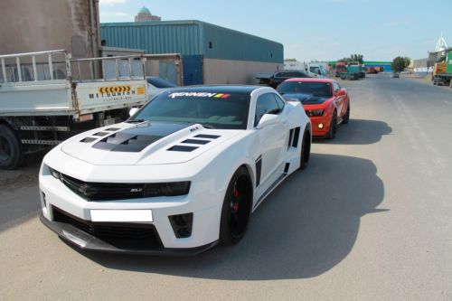 Custom made 2013 camaro zl1 with one of a kind wide body kit and lambo doors