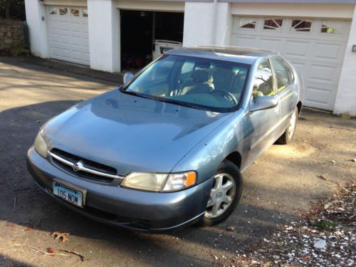 Blue, well maintained, auto, ac, pw, pl, cd/cassette, 4 door, 125,300 miles