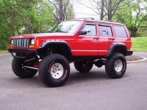 1997 jeep cherokee sport, lifted, 35x12.5 tires, must see, thousands invested